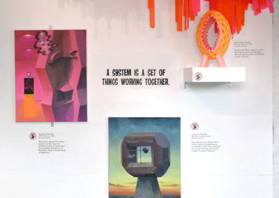 We begin with a grouping of four works, which illustrate a word from the exhibition's name: system. As the label notes, "A system is a set of things working together." These sculptures and paintings belong together on a visual level, especially because of color. Look at how the warm pinks and oranges flow from one piece to the next. Pictured: (Top Right) Dana Lynn Harper, Bloom Bloom, 2014-2019, Flagging tape and chicken wire. (Middle Right) Dana Lynn Harper, Sponge Mouth, 2017, Acrylic on clay. (Left) Jackson O'Brasky, Wild Horses, 2019, Oil on canvas. (Bottom) Jackson O'Brasky, My Best Friend, 2019, Oil on canvas.